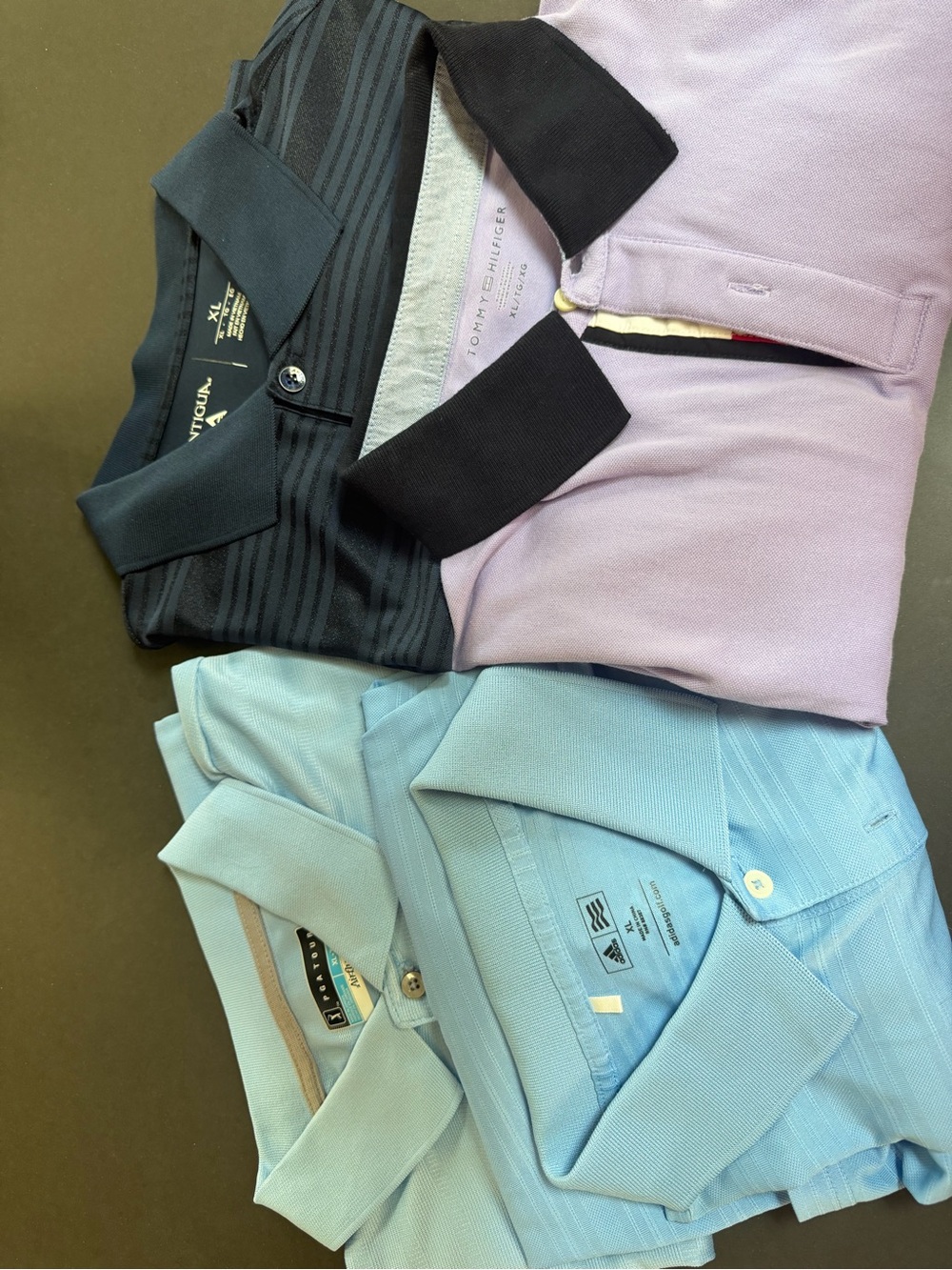 Four men’s golf shirts